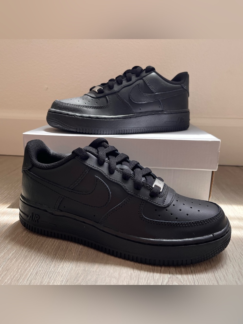 Kids All-Black Low-Top Leather Sneakers